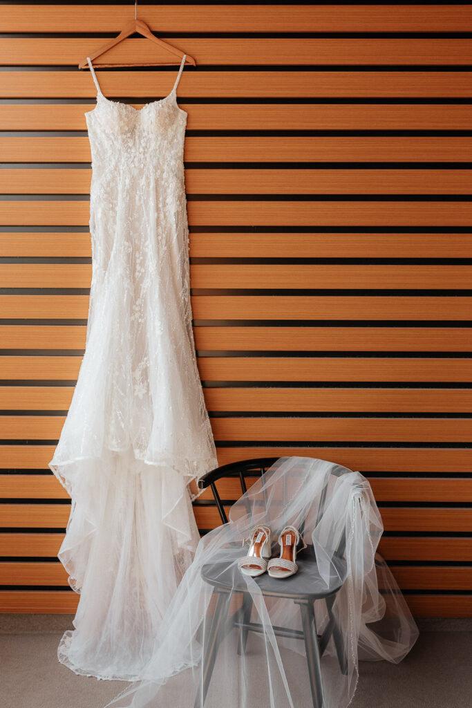detail of wedding dress, shoes and veil for a stewart creek wedding in canmore, alberta