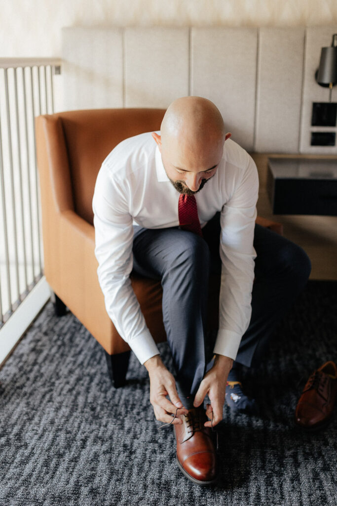 groom getting ready for wedding day