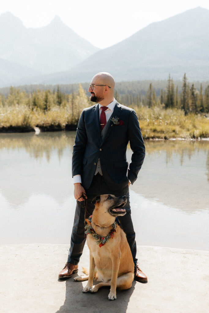 groom portrait with his dog