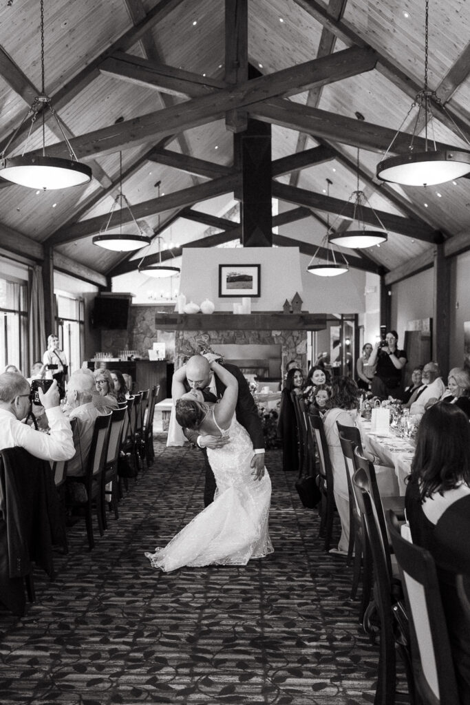 kissing at the wedding reception