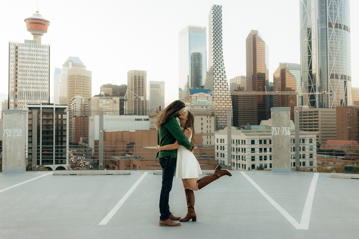 A couple their platform parkade engagement session