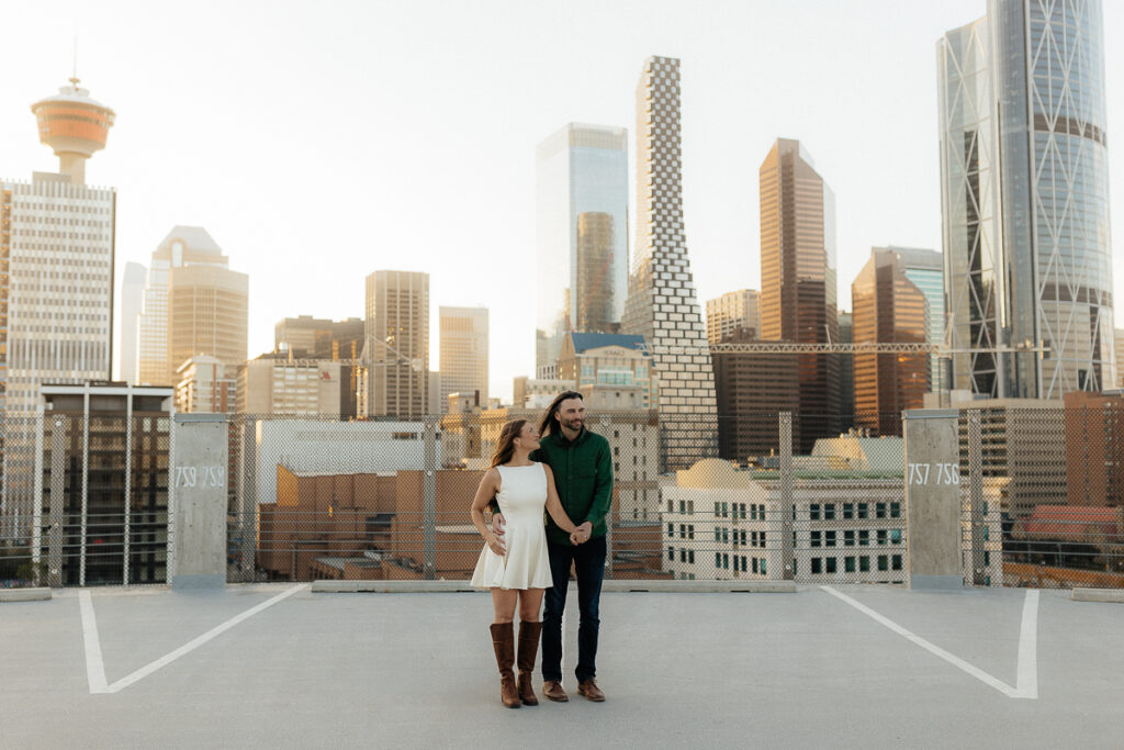 A couple their platform parkade engagement session